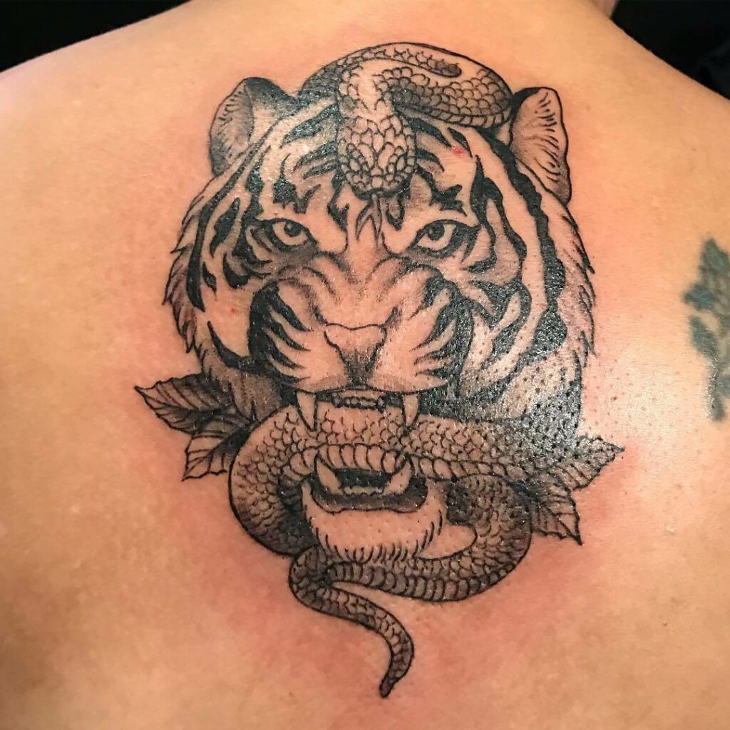 12+ Chinese Snake Tattoo Ideas To Inspire You! 12 A Tiger And A Snake Tattoo