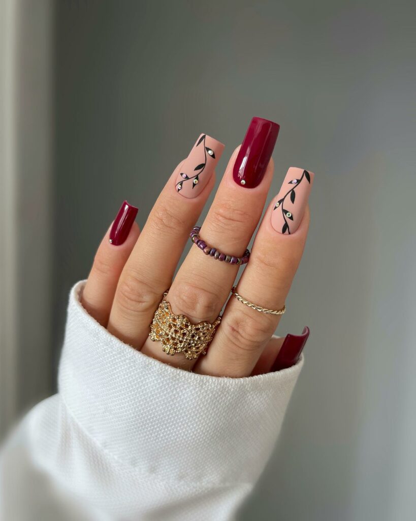 20 Latest Dark Red Nail Ideas To Try In 2024! 14 Red Nails with Abstract Face Line Art