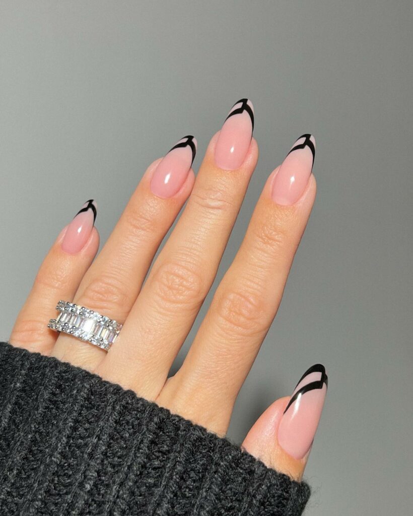 30 Latest Black Almond Nail Ideas To Try In 2024! 39 Avant-Garde Black Tips on Nude Almond Nails