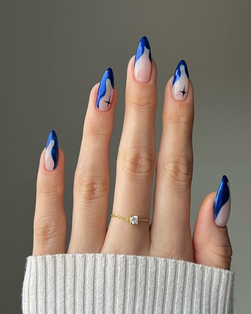 Feel Festive with 30 Blue Christmas Nail Ideas in 2024 25 Abstract French Blue Christmas Nails