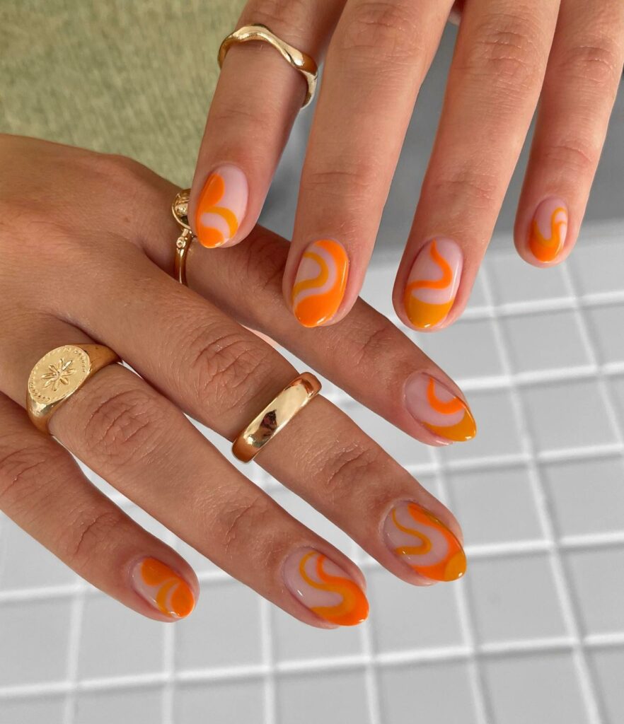 40 Latest Orange Nail Designs to Try in 2024 10 Abstract Orange Jelly Nail
