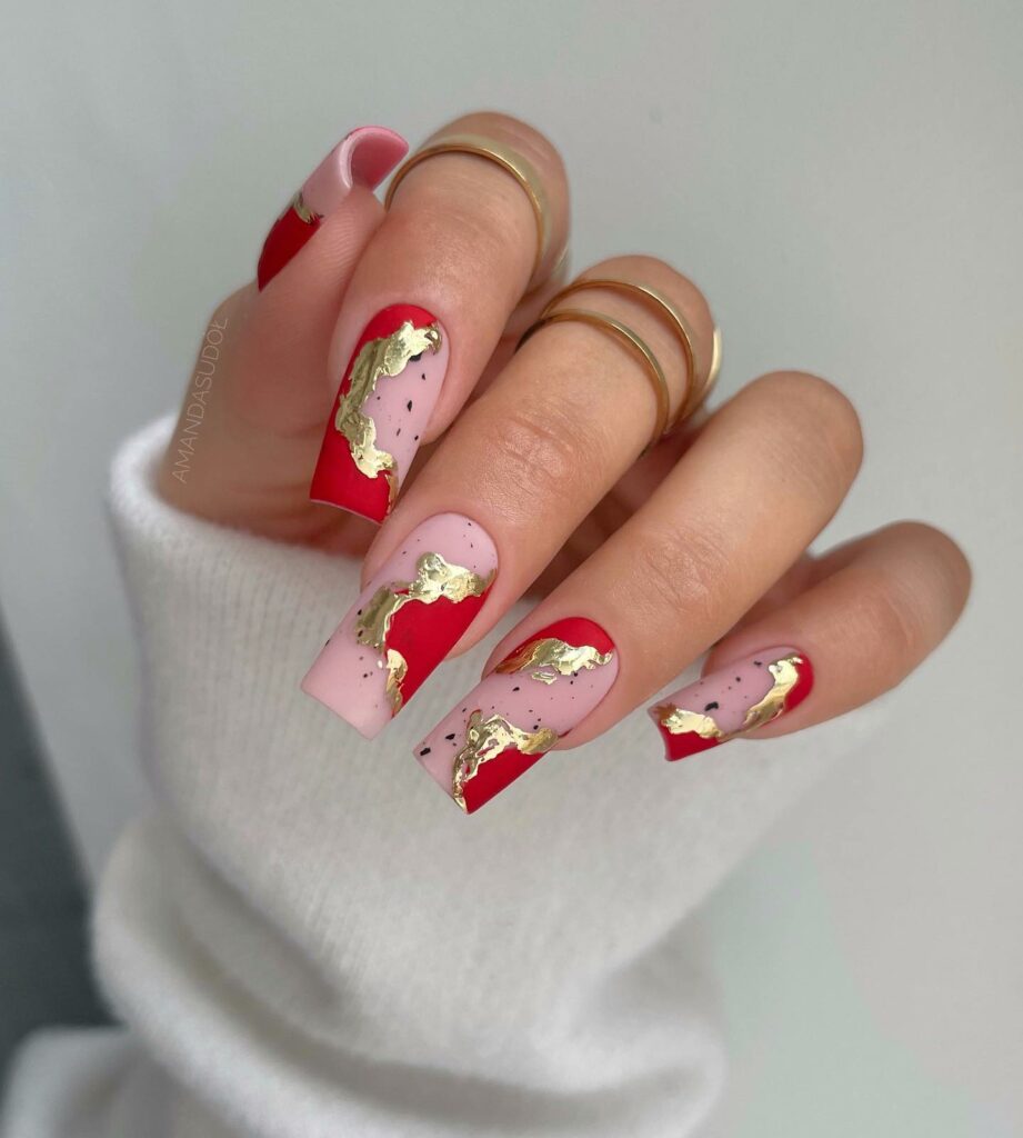 Shine Bright with 30 Red and Gold Christmas Nail Ideas in 2024 27 Abstract Artistry in Red and Gold Christmas Nails