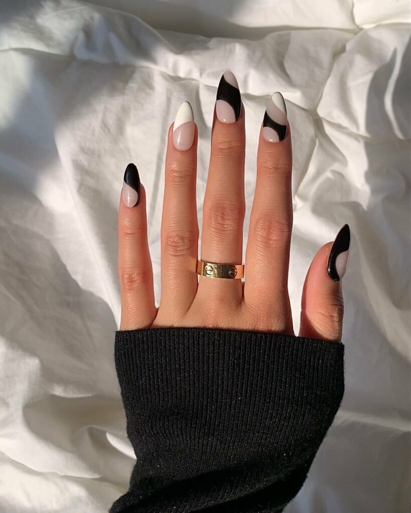 30 Latest Black Almond Nail Ideas To Try In 2024! 41 Abstract White and Black Almond Nails