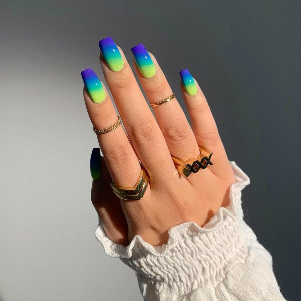 Experiment with 30 Stunning Blue Ombré Nails for 2024 11 Abstract blue ombre nails