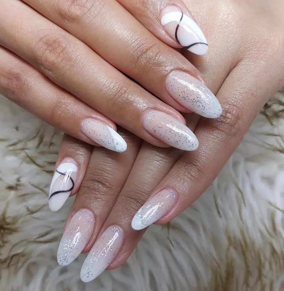59 White Glitter Nail Designs To Try In 2024! 28 Abstract glitter white nails
