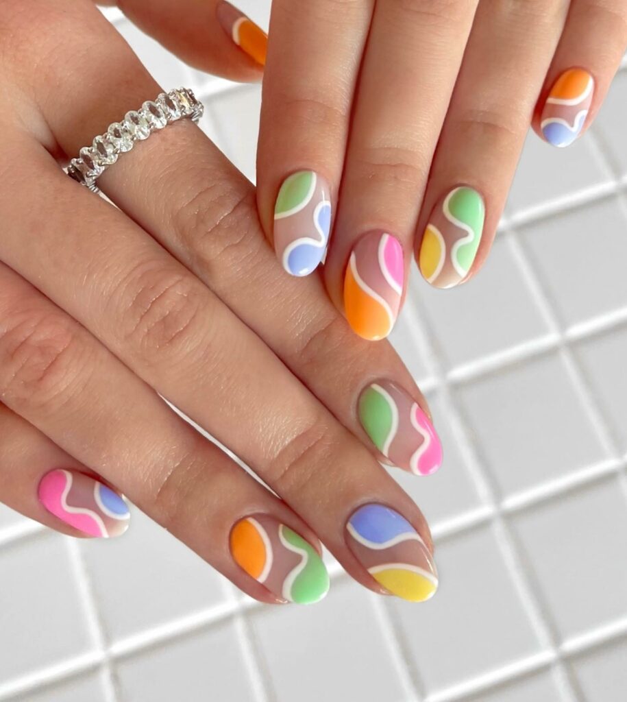 34 Latest Pastel Nail Designs To Try in 2024! 29 Abstract pastel nails