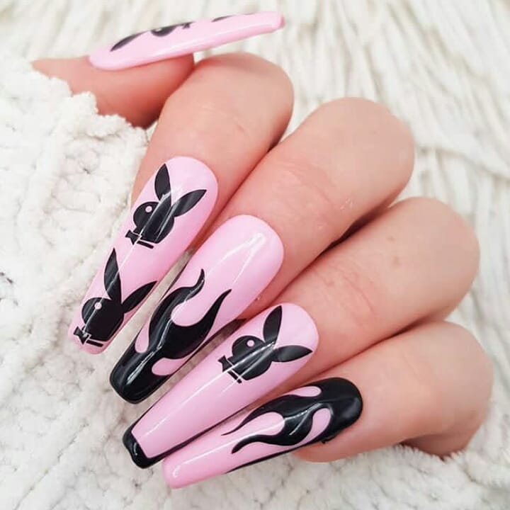 28 Stunning Playboy Nail Designs for 2024 28 Acrylic Pink Playboy Nails with Flames Accents