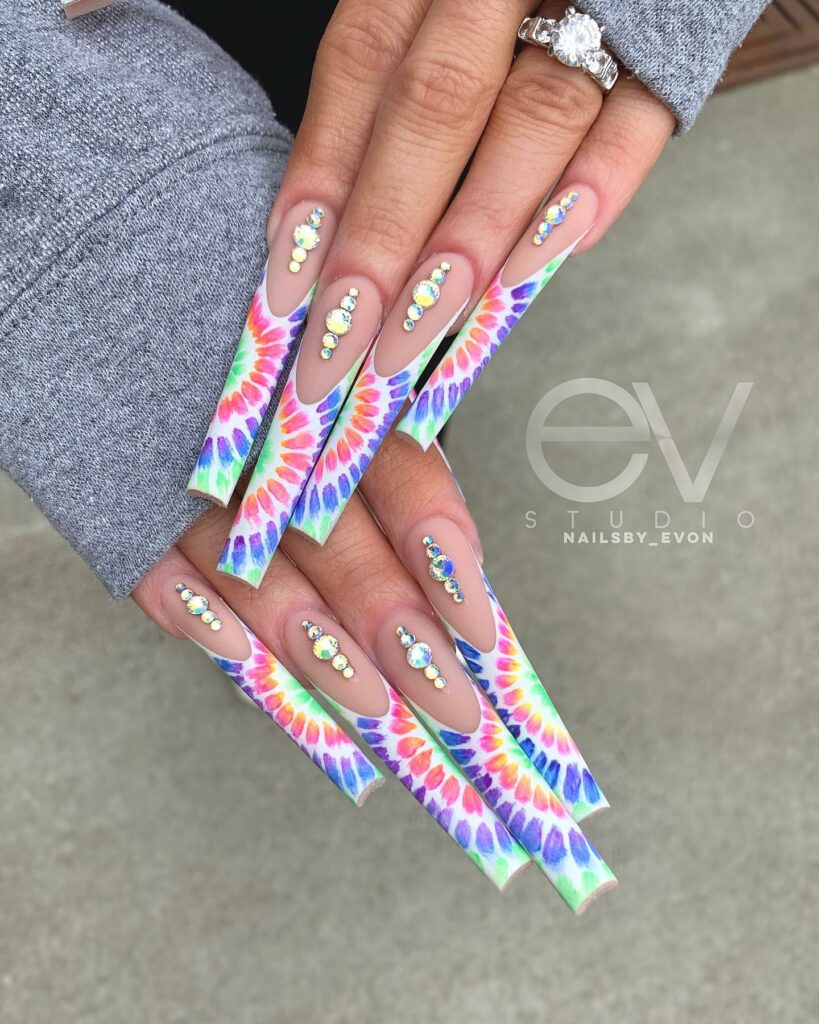Get Artsy with 25 Tie-Dye Nail Designs in 2024 32 Acrylic Tie-Dye Nails with Gemstone Embellishments