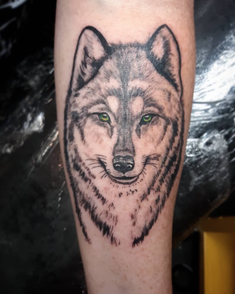 12+ Wolf Face Tattoo Ideas To Inspire You! 19 Adorable Green-Eyed Wolf Tattoo
