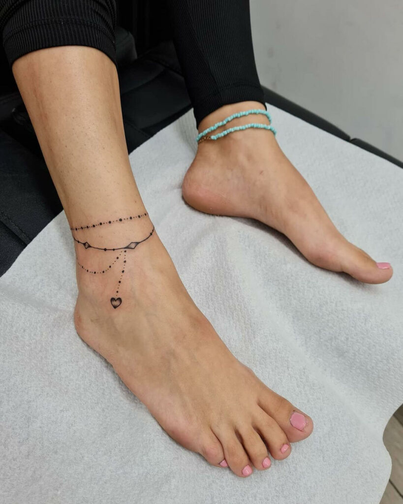 31 Latest Ankle Bracelet Tattoos To Inspire You In 2024! 13 Alluring Charm Anklet Tattoo Designs