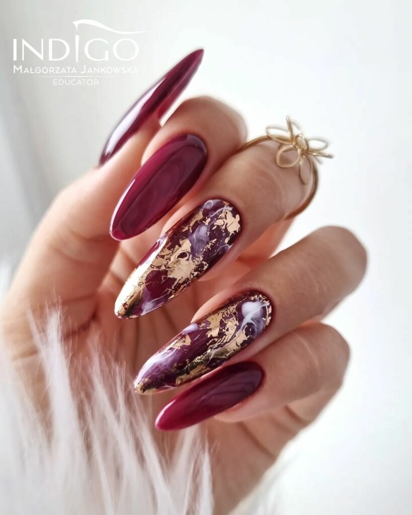 25 Latest Burgundy And Gold Nail Ideas To Try In 2024! 12 Burgundy and Gold Almond Shaped Nails