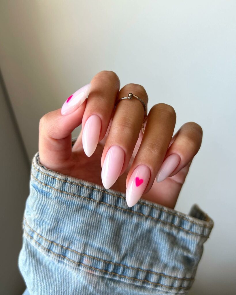 Adorn Your Nails with 30 Light Pink Nail Designs in 2024 14 Almond Light Pink Nails with Heart Accents
