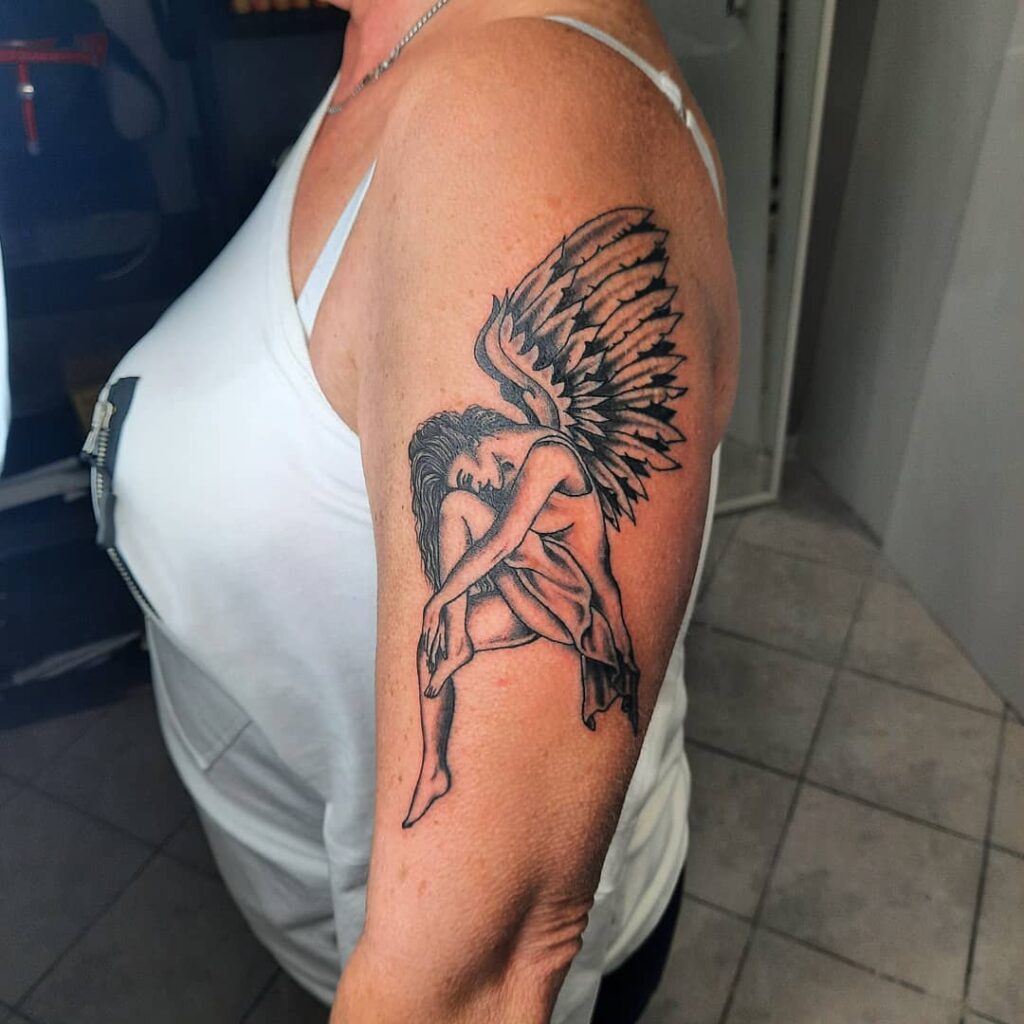 11+ Female Protector Guardian Angel Tattoo Ideas That Will Blow Your Mind! 13 Angel's Wings Tattoo