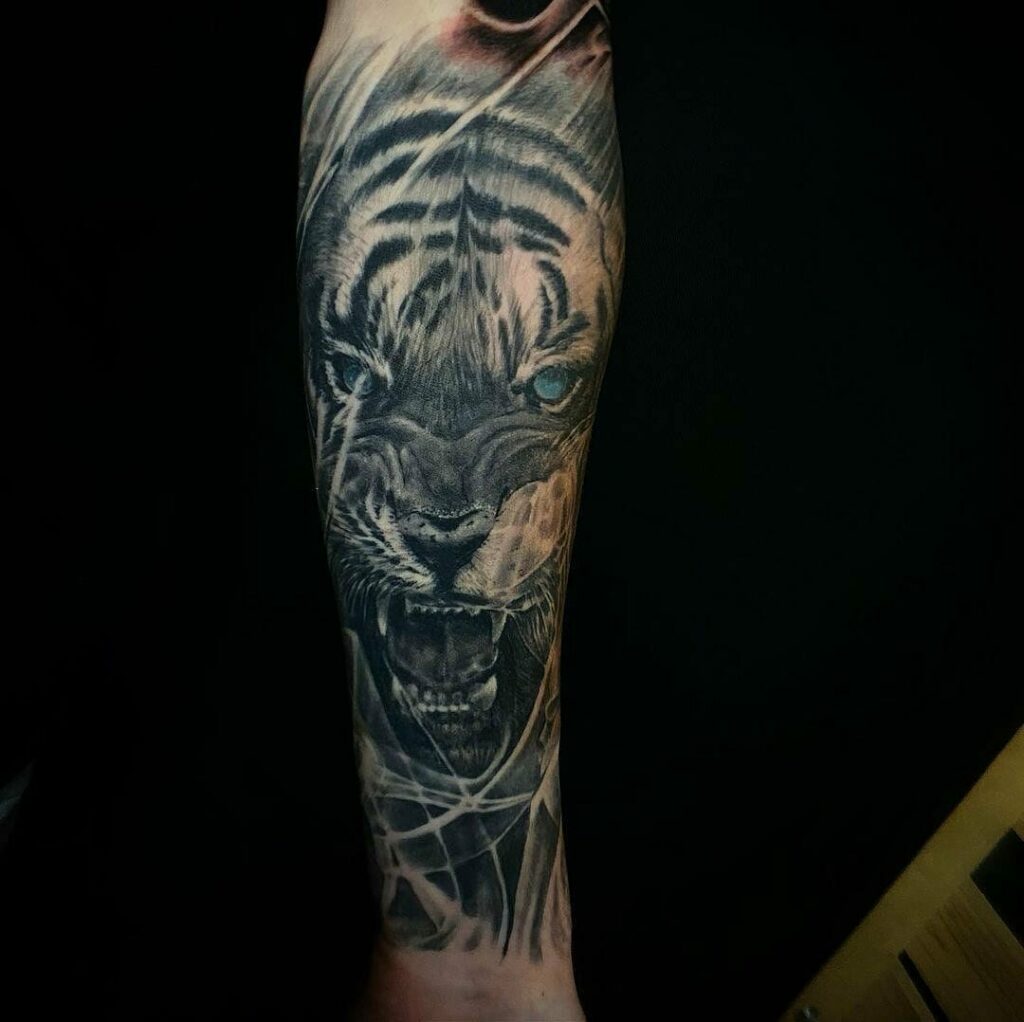11+ Forearm Tiger Tattoo Ideas That Will Blow Your Mind! 12 Angry Tiger Tattoo For Men