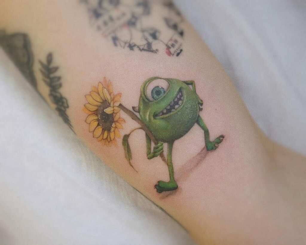 11+ Mini Small Sunflower Tattoo Ideas That Will Blow Your Mind! 19 Animated Character And Sunflower Tattoo Ideas