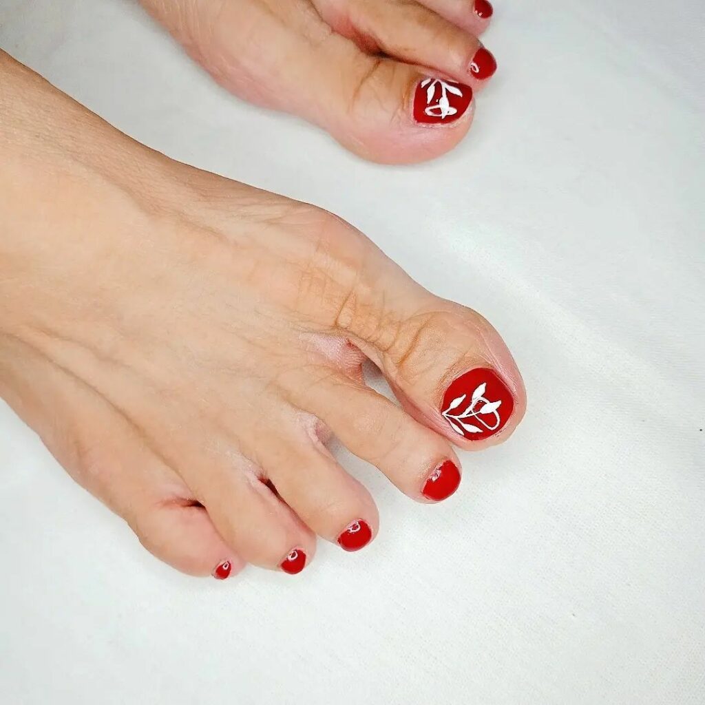 30 Red Pedicure Ideas to Add a Pop of Color to Your Look in 2024 23 Red Pedicure With Feature