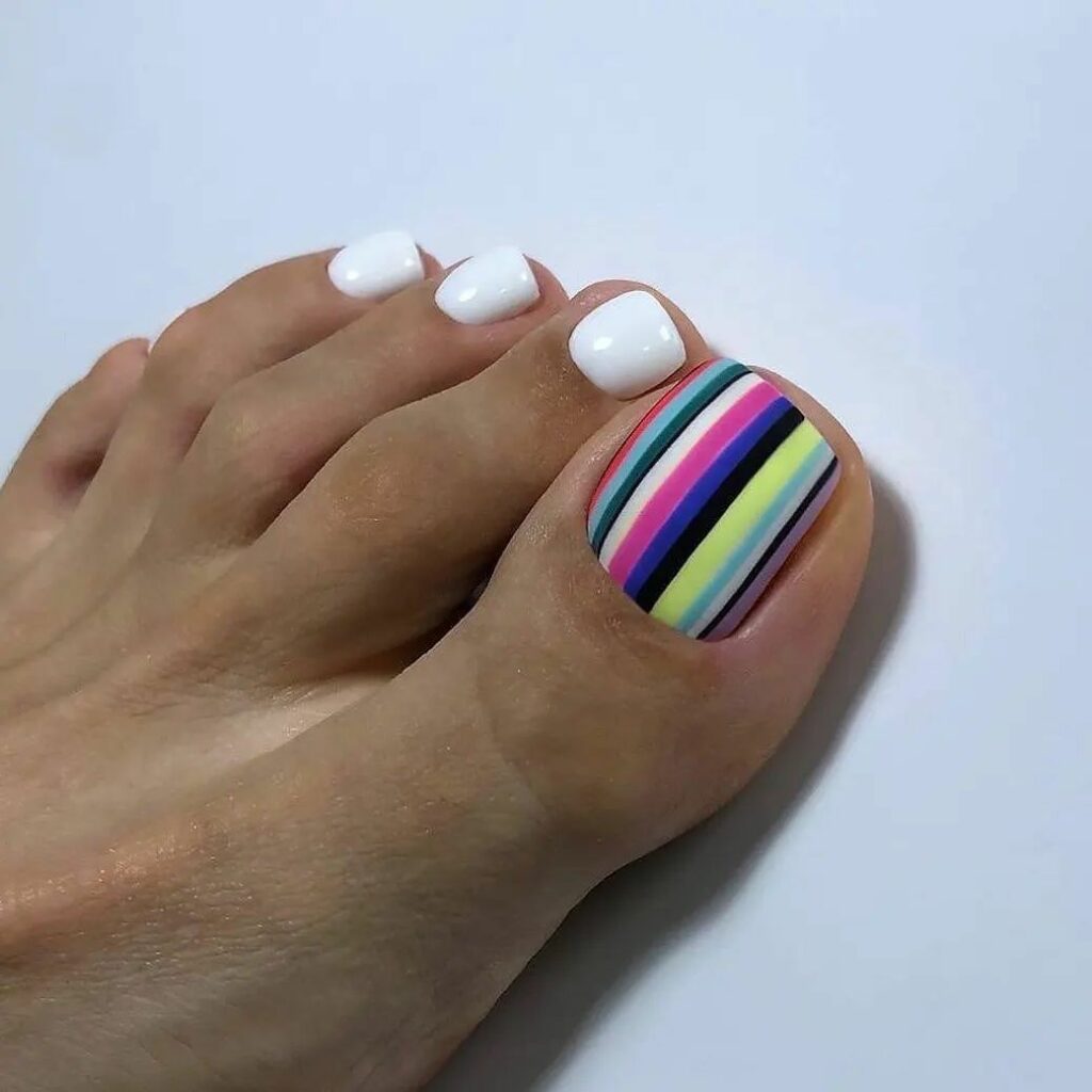35 Rainbow Pedicure Ideas to Add Vibrancy to Your Look in 2024 26 Seeing Stripes
