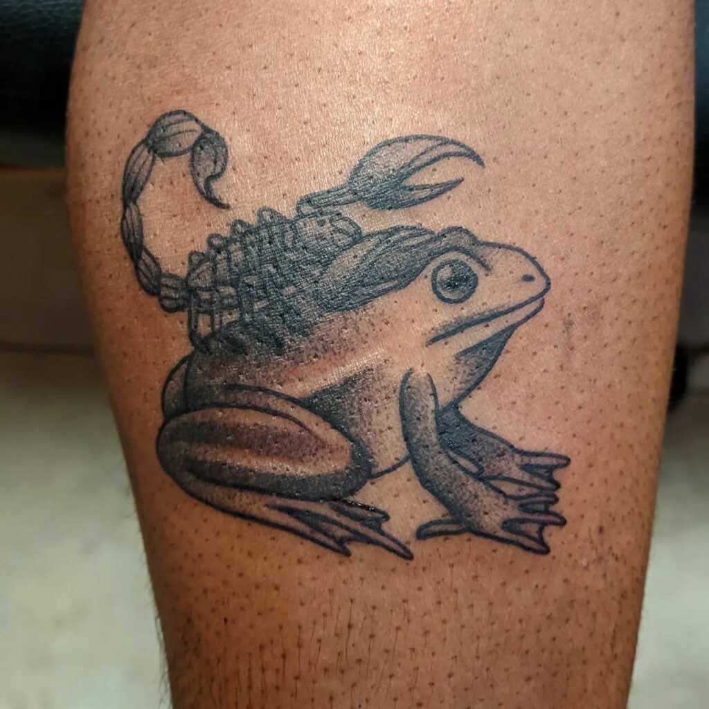 22 AMAZING SCORPION TATTOO DESIGNS - UPDATED FOR 2024 17 Scorpion and the Frog Tattoo