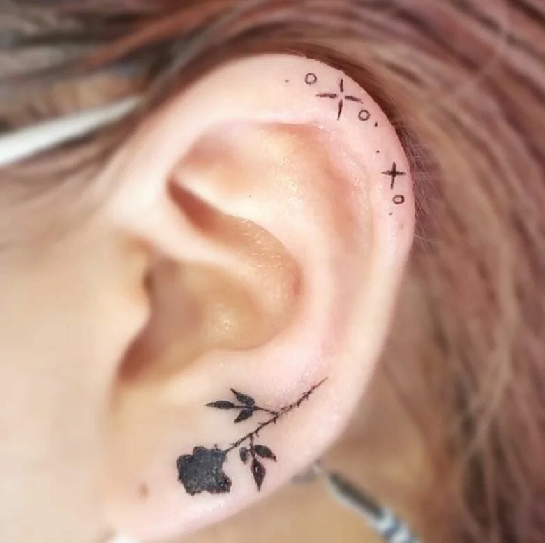 12+ Rose With Thorns Tattoo Ideas To Inspire You! 12 Tiny Silhouette Black Rose Tattoo