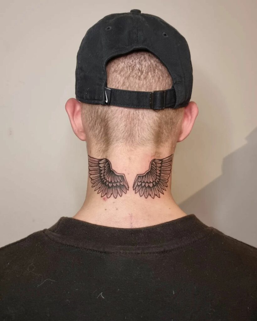 90 Latest Neck Tattoo Ideas To Inspire You In 2024! 19 Wings Neck Tattoo