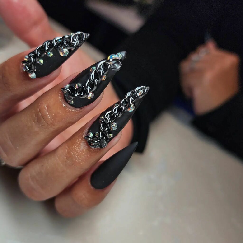 40 Latest Black Stiletto Nail Ideas To Try In 2024! 10 Chained Black Stiletto Nails
