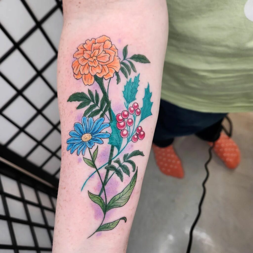 AMAZING MARIGOLD TATTOO DESIGNS & MEANINGS TO INSPIRE YOU IN 2024 27 Larkspur and Marigold Tattoo