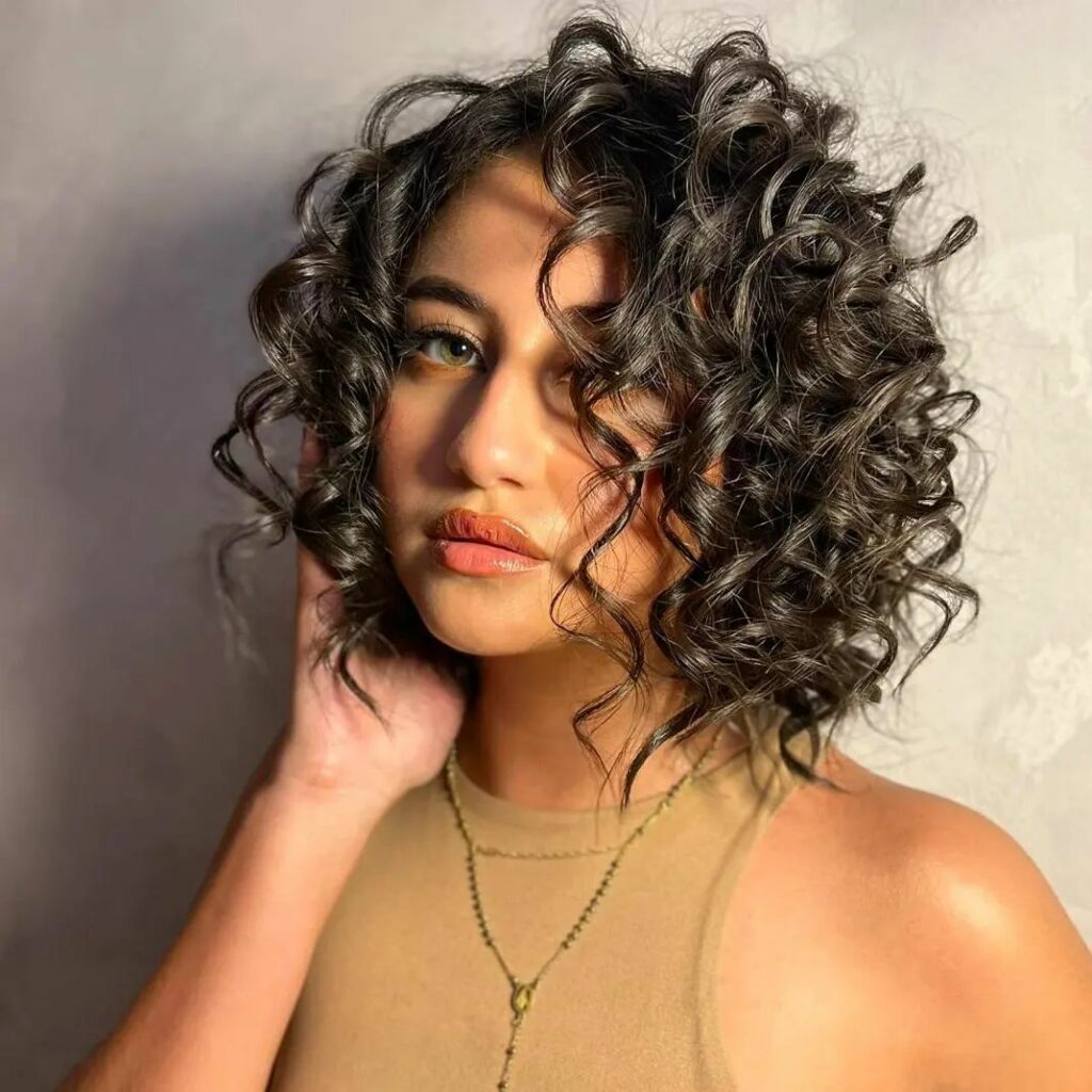 25 Short Layered Haircut Ideas to Revamp Your Look in 2024 21 Center-Parted Lob