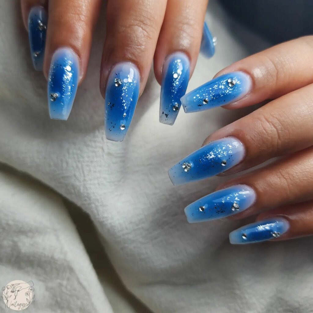 Feel Festive with 30 Blue Christmas Nail Ideas in 2024 39 Icy Blue Glitter Ombré