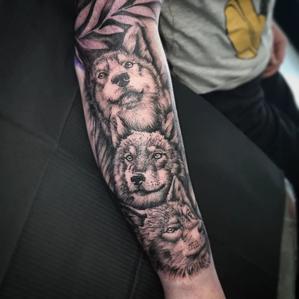 12+ BEST WOLF TATTOO DESIGNS & MEANING FOR MEN AND WOMEN 19 Wolf Pack Tattoo