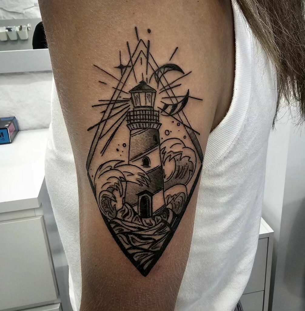 11 LIGHTHOUSE TATTOOS IDEAS + MEANINGS - UPDATED 2024 19 Blackwork Lighthouse Tattoos