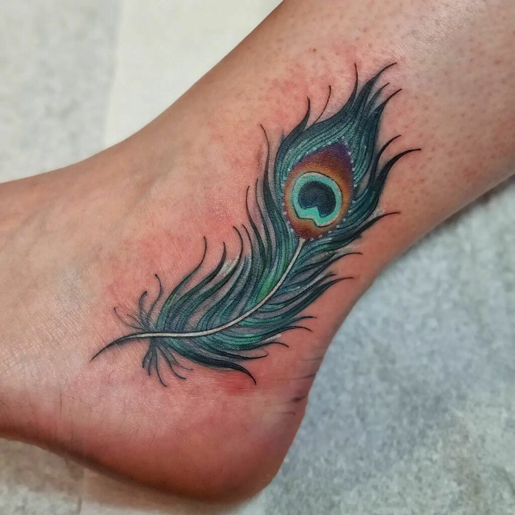 Top 10 Peacock Tattoo Designs + Meanings In 2024 17 Peacock Feathers