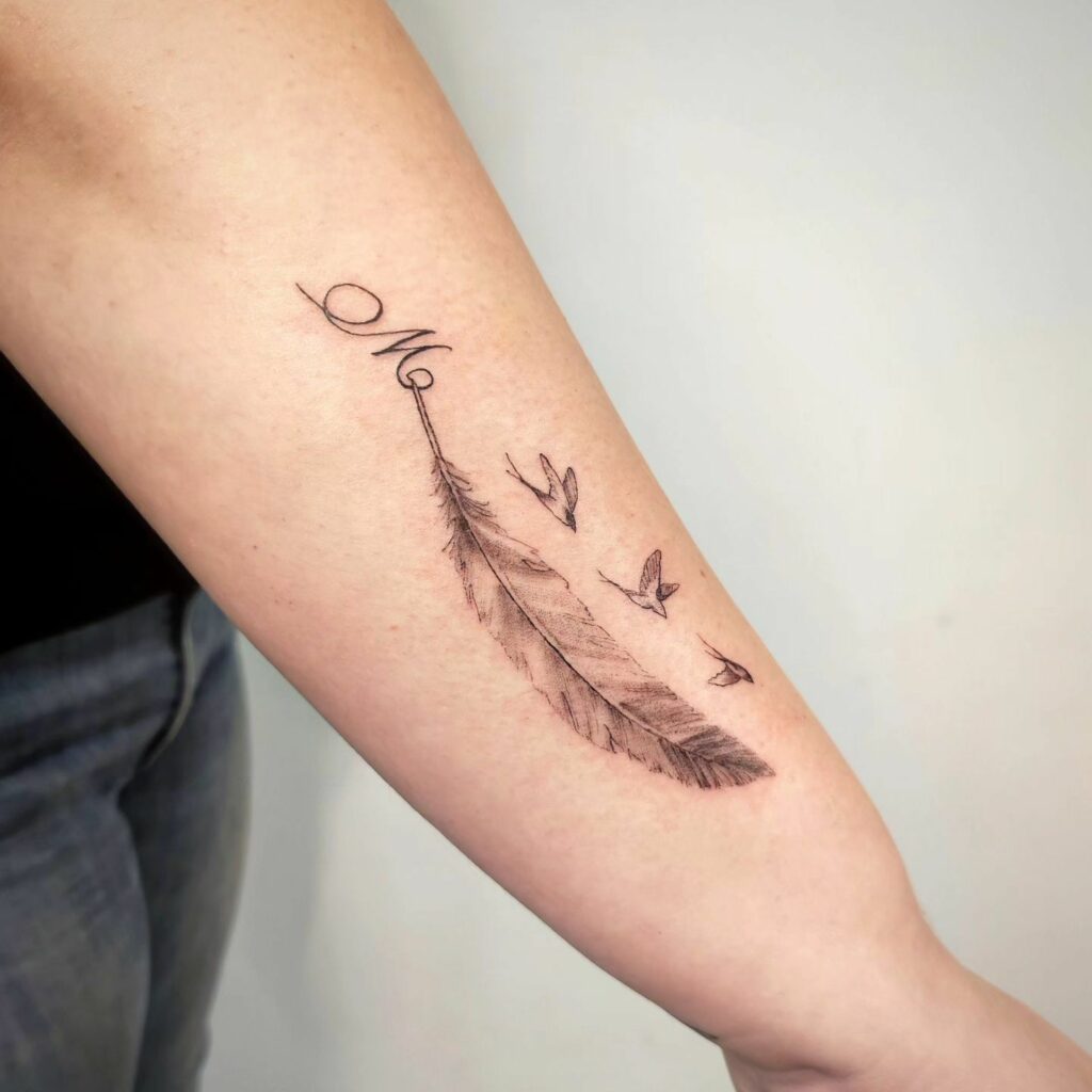 TOP 10 FEATHER TATTOO IDEAS + MEANINGS FOR 2024! 15