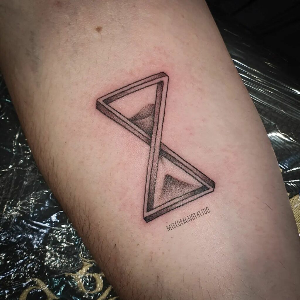 10 AMAZING HOURGLASS TATTOOS & THEIR MEANINGS - UPDATED FOR 2024 12 Infinity Hourglass Tattoos
