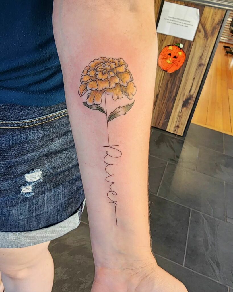 AMAZING MARIGOLD TATTOO DESIGNS & MEANINGS TO INSPIRE YOU IN 2024 32 Marigold Tattoo with Name or Lettering Tattoos