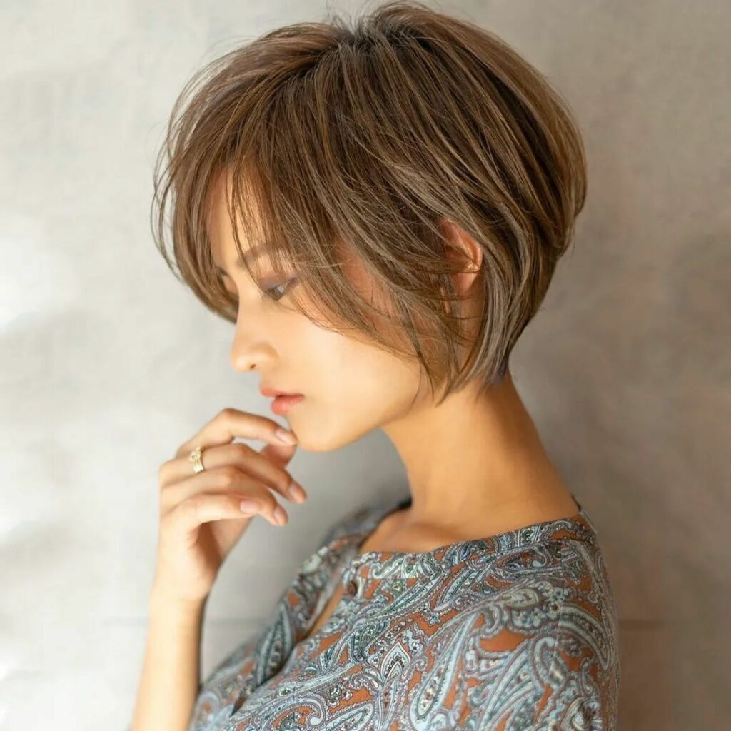 25 Short Layered Haircut Ideas to Revamp Your Look in 2024 11 Stacked Chin Bob