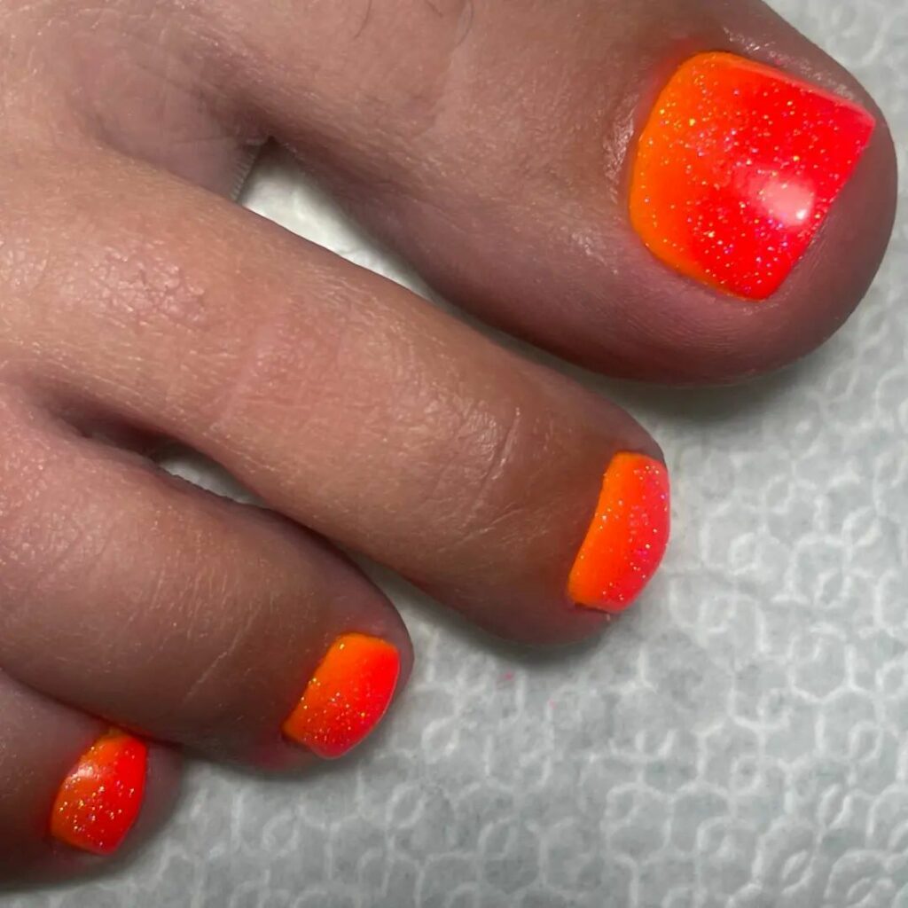 30 Ombre Pedicure Ideas to Experiment with in 2024 23 Orange Ombre