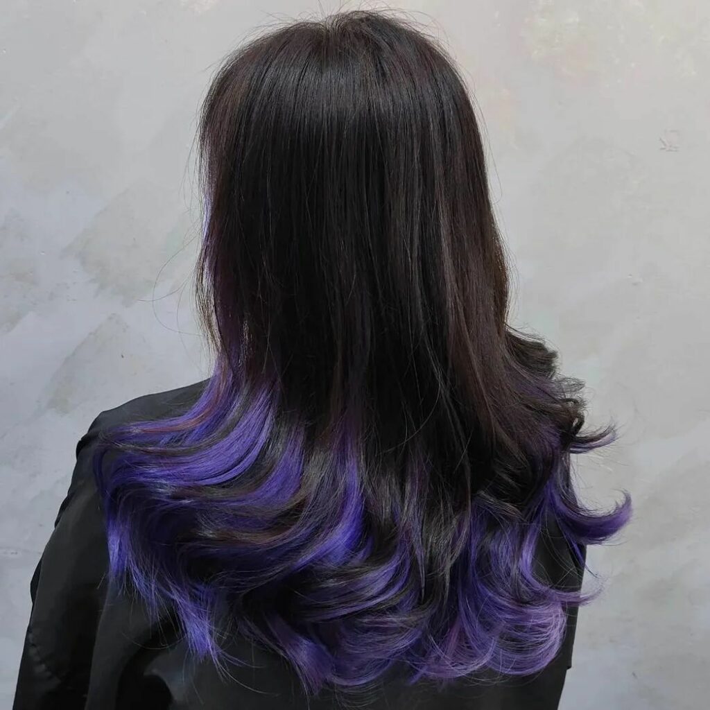 40 Purple Highlight Hair Ideas to Try in 2024 30 Tousled and Subtle