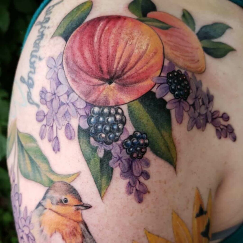 16 Latest Apple Tattoos To Inspire You In 2024! 25 Apple Grapes Lavender Flowers Tattoo