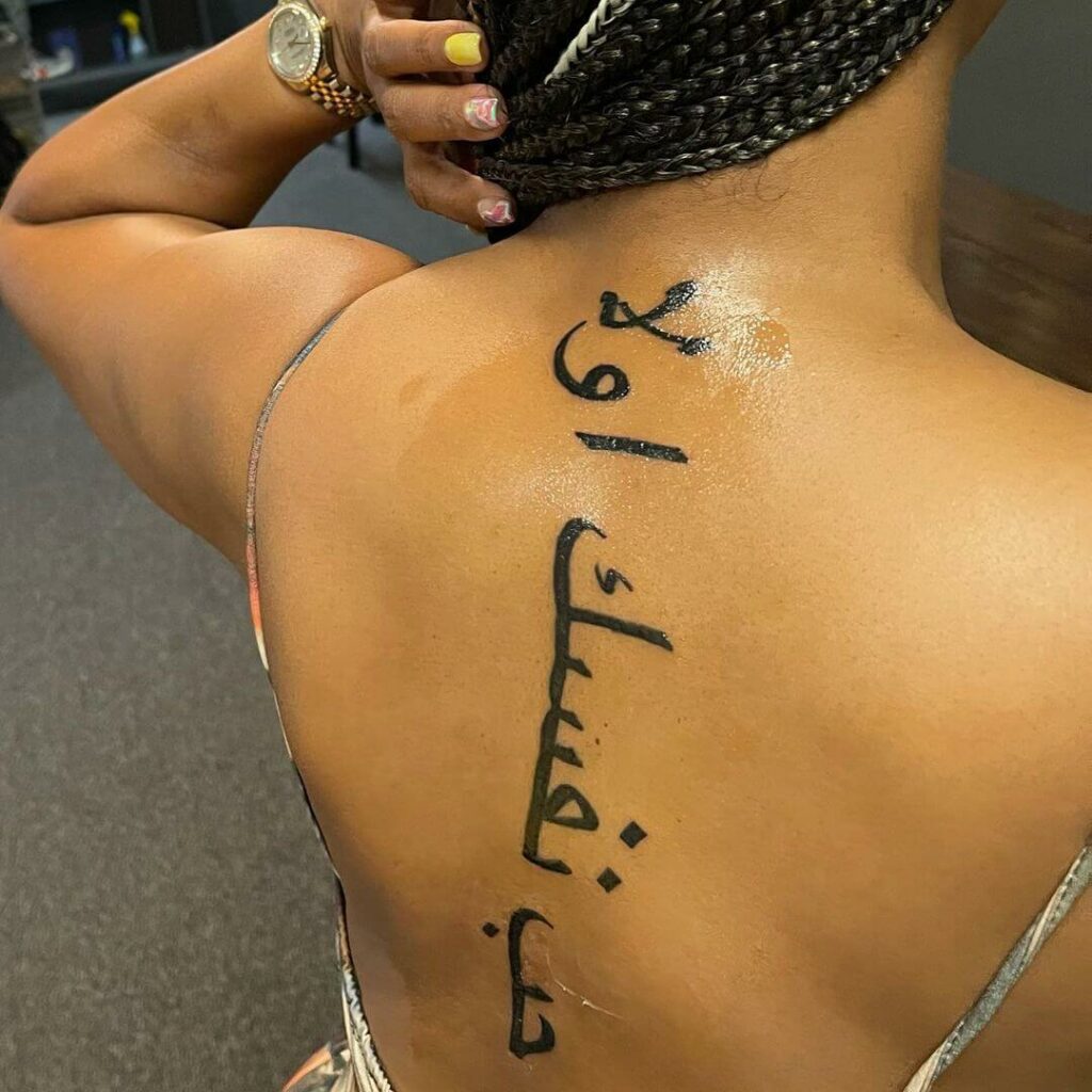 11 Latest Arabic Tattoos To Inspire You In 2024! 20 Arabic Spine Tattoo