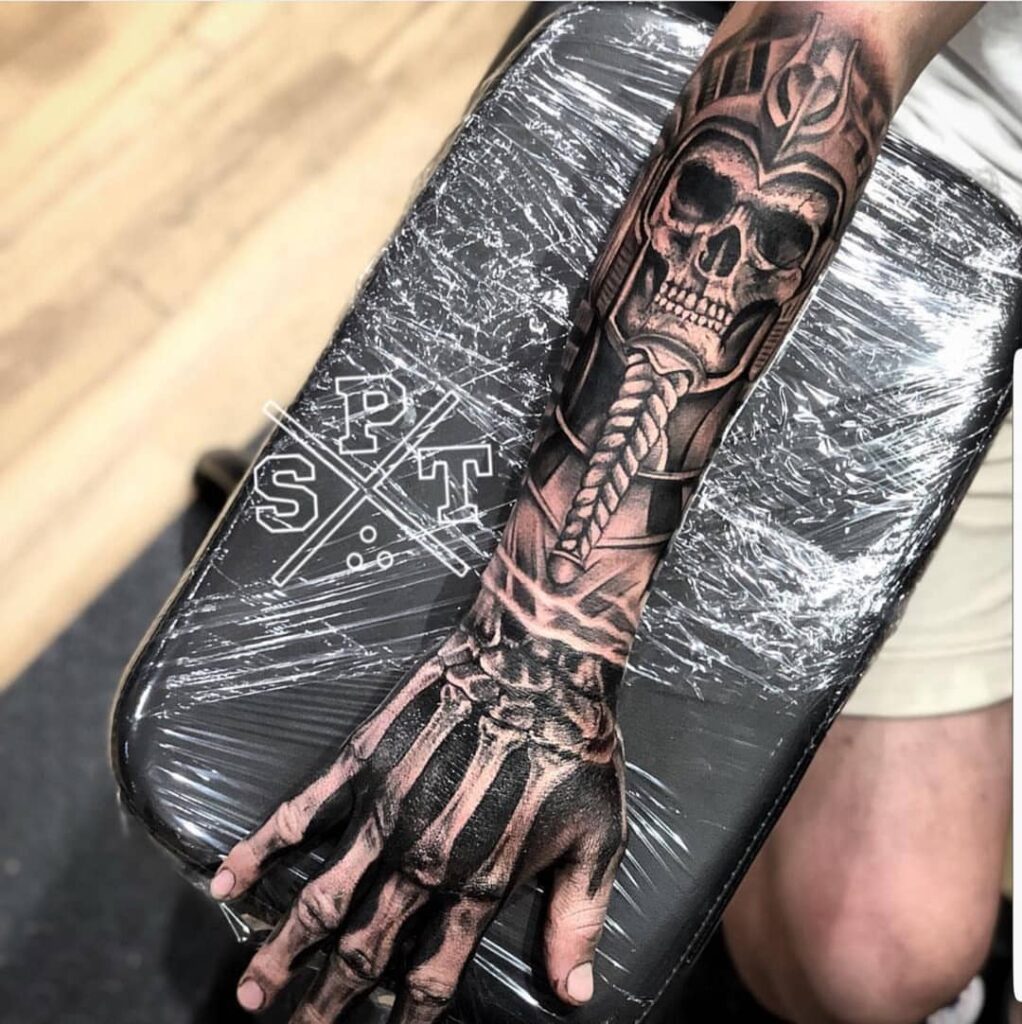 34 Hand Skeleton Tattoo Designs for 2024 11 Arm Skeleton Tattoo