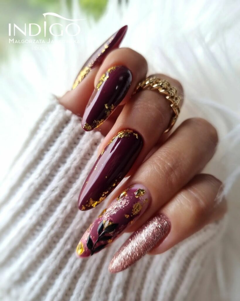 25 Latest Burgundy And Gold Nail Ideas To Try In 2024! 14 Artistic Burgundy and Gold Nails