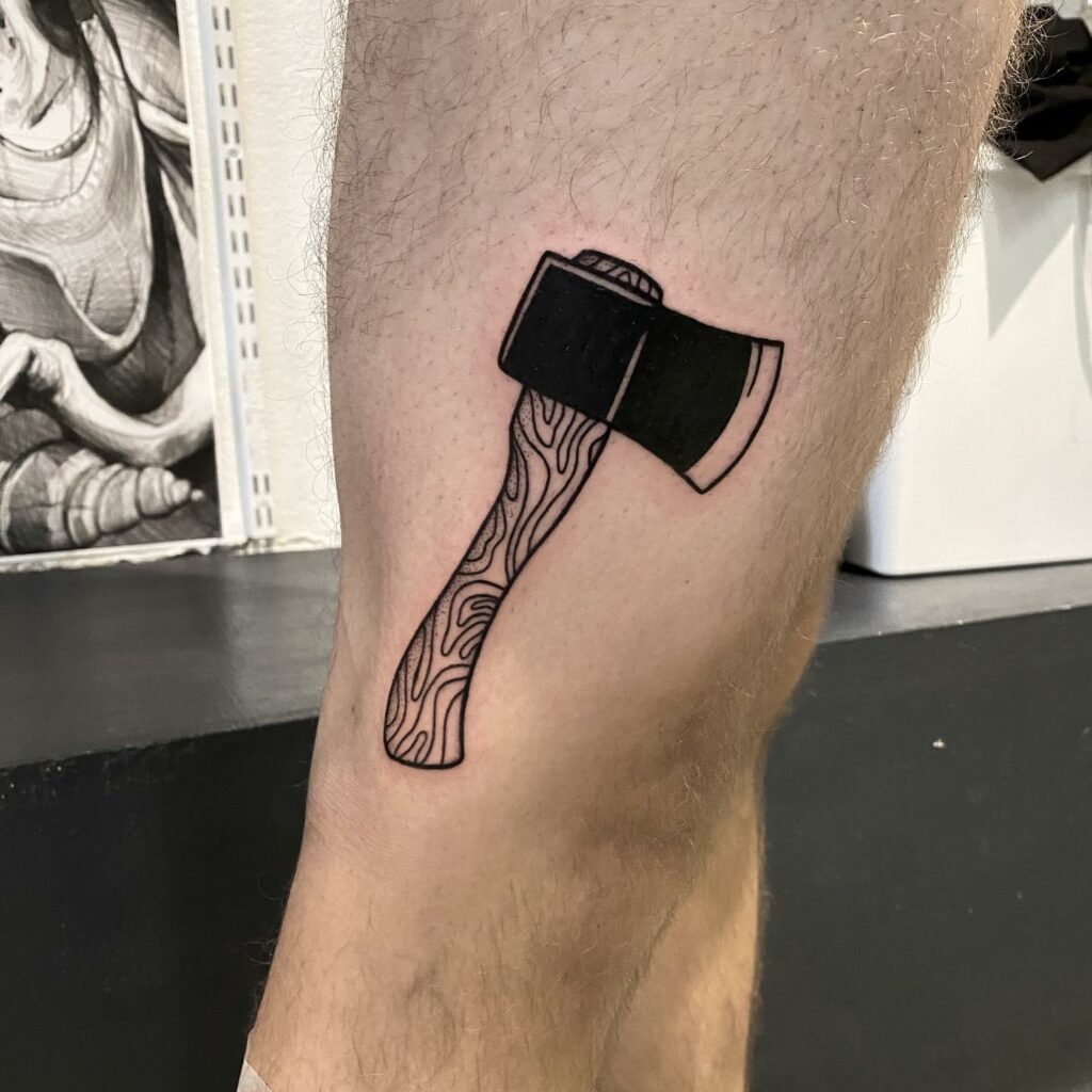 10+ Gap Filler Tattoo Filler Ideas That Will Blow Your Mind! 15 Axe Tattoo Filler