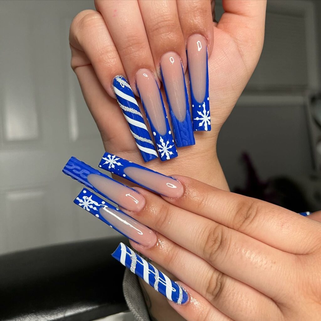 Enjoy 20 Candy Cane Nail Designs in 2024 21 Azure Delights with Snowflake Accents