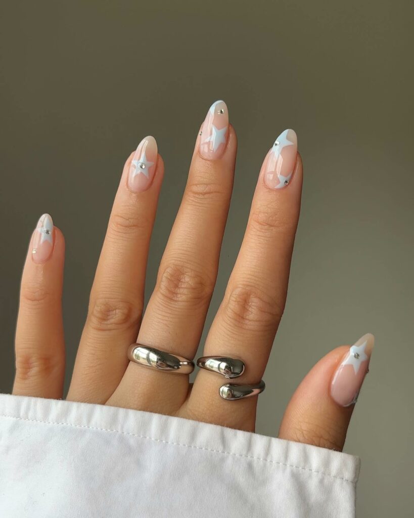 Mesmerizing Galaxy Nail Designs to Try in 2024 π 53 Baby Blue Nails with Stars