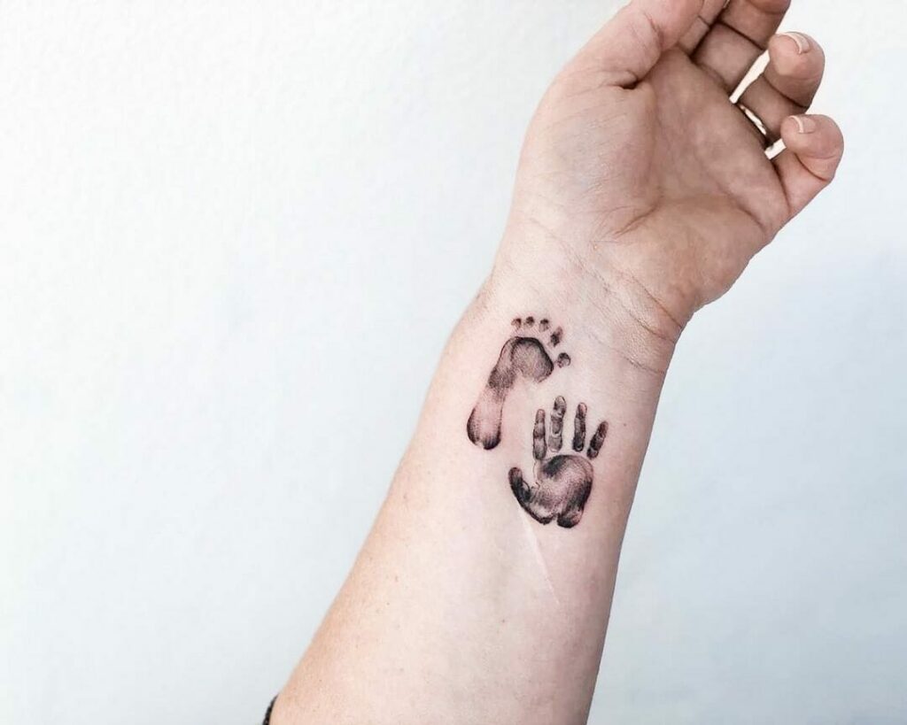 11+ Baby Footprint Tattoo Ideas You'll Have To See To Believe! 19 Baby Footprint And Handprint Tattoo