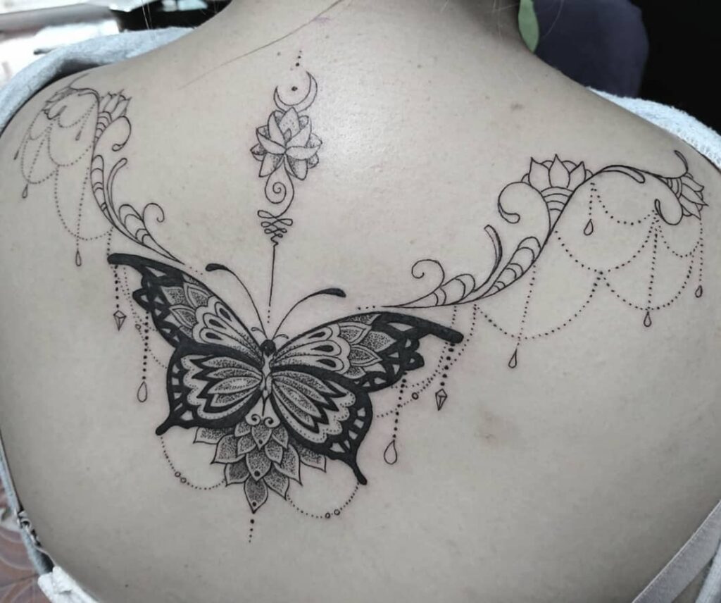 10+ Black Butterfly Tattoo Ideas You'll Have To See To Believe! 12 Back Butterfly Tattoo