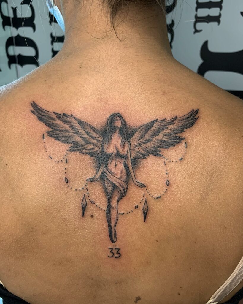 11+ Female Protector Guardian Angel Tattoo Ideas That Will Blow Your Mind! 12 Beautiful Guardian Angel Tattoo