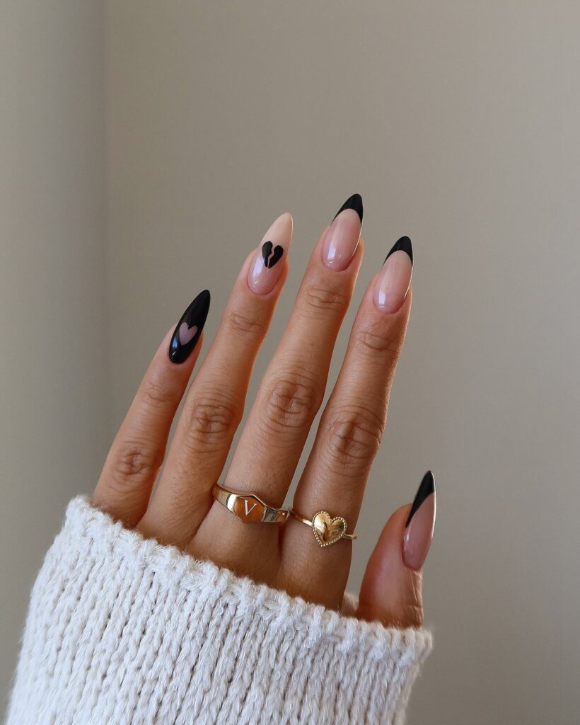 30 Latest Black Almond Nail Ideas To Try In 2024! 14 Romantic Black Almond Nails with Heart Motifs