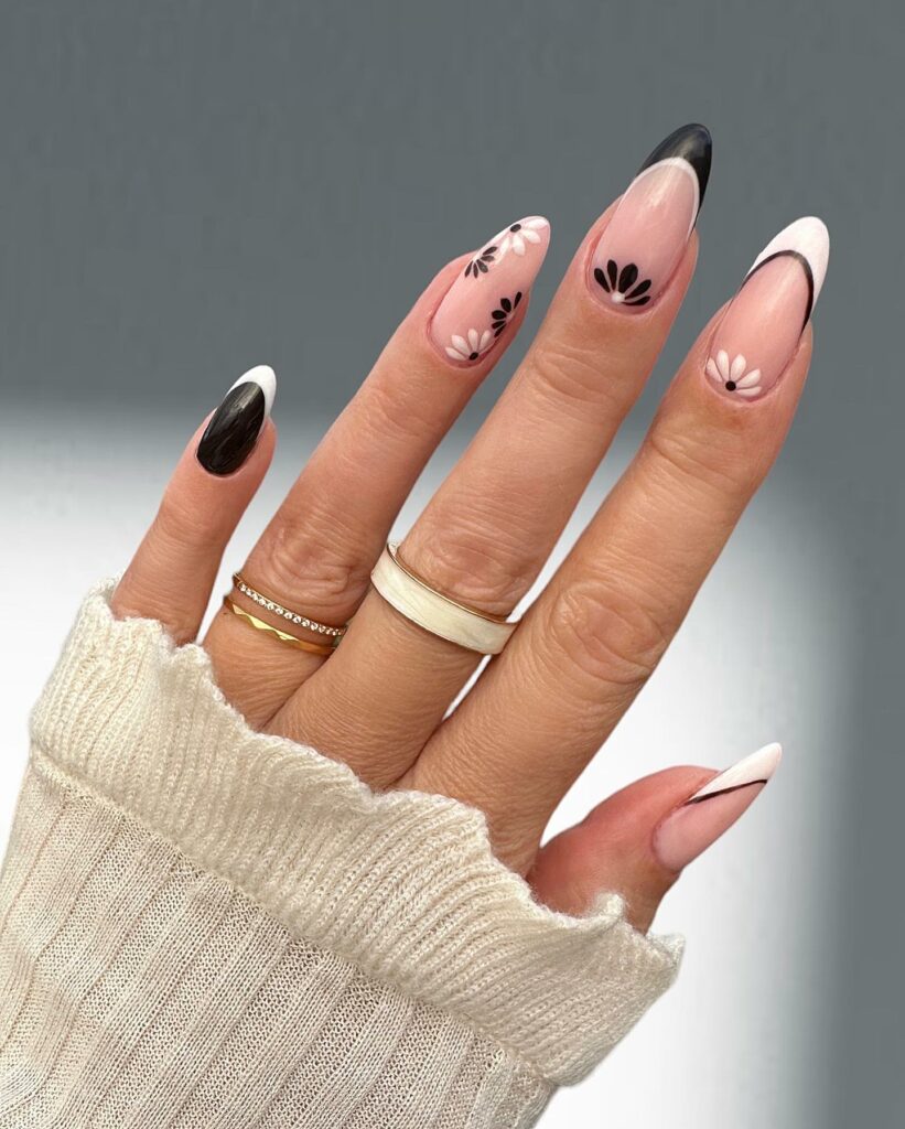 30 Latest Black Almond Nail Ideas To Try In 2024! 15 Black Almond Nails with Delicate Florals