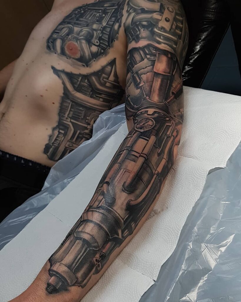 11 Latest Arm Sleeve Tattoos To Inspire You In 2024! 18 Black And Grey 3D Robot Arm Tattoo Sleeve Tattoo Designs For Men And Women